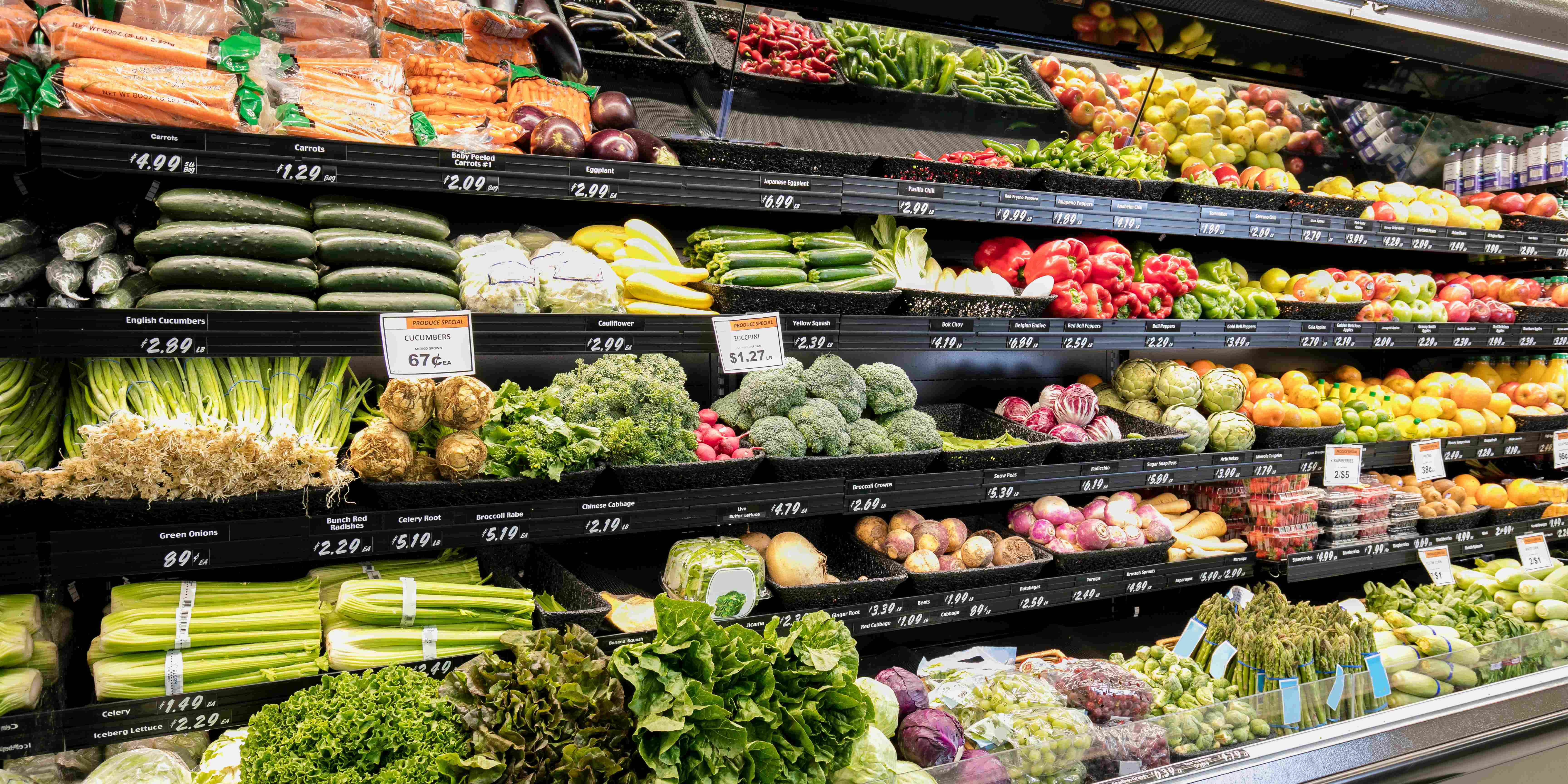 Vegetable shelves in a grocery store.