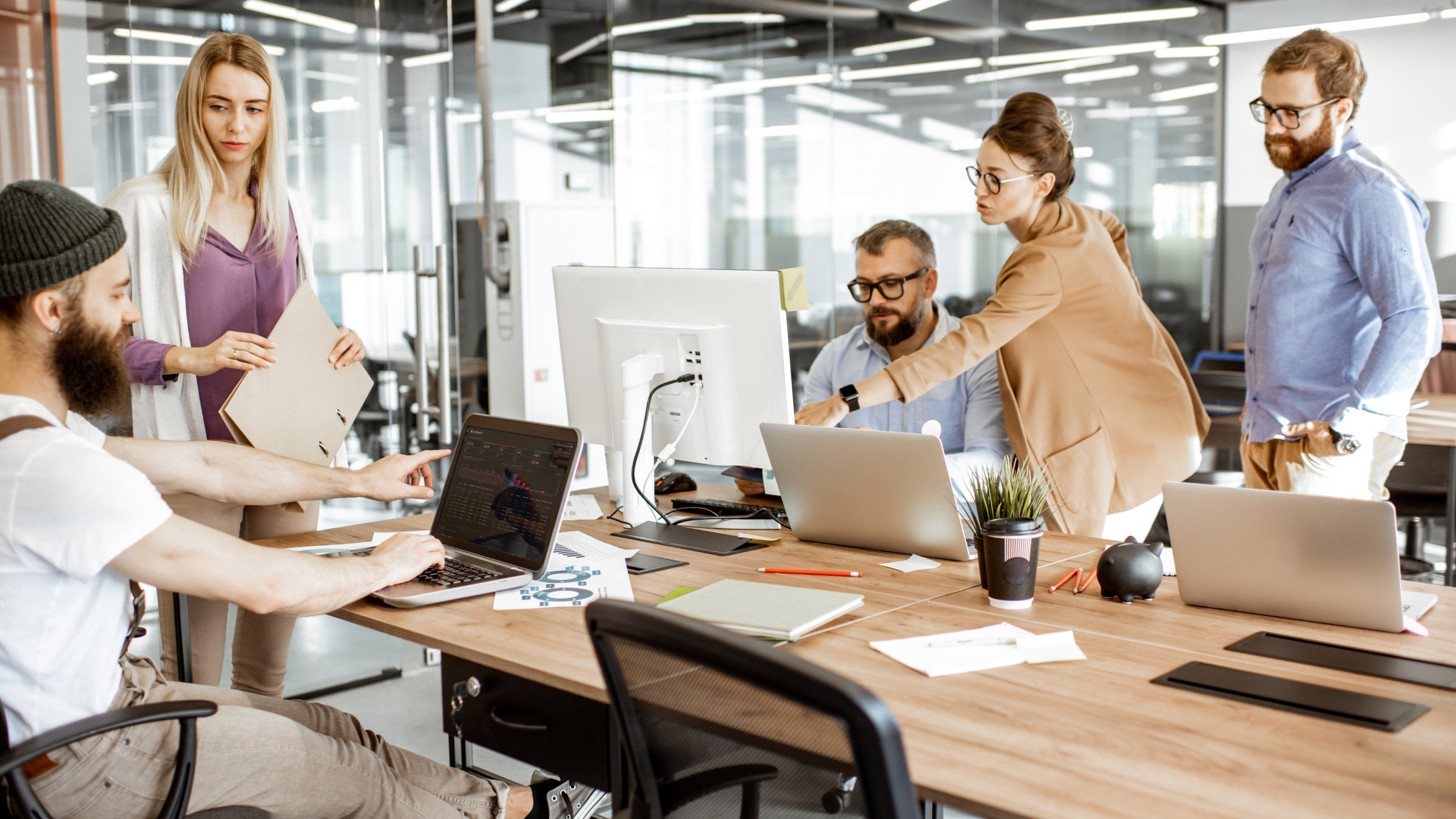 A group of employees talking to each other.