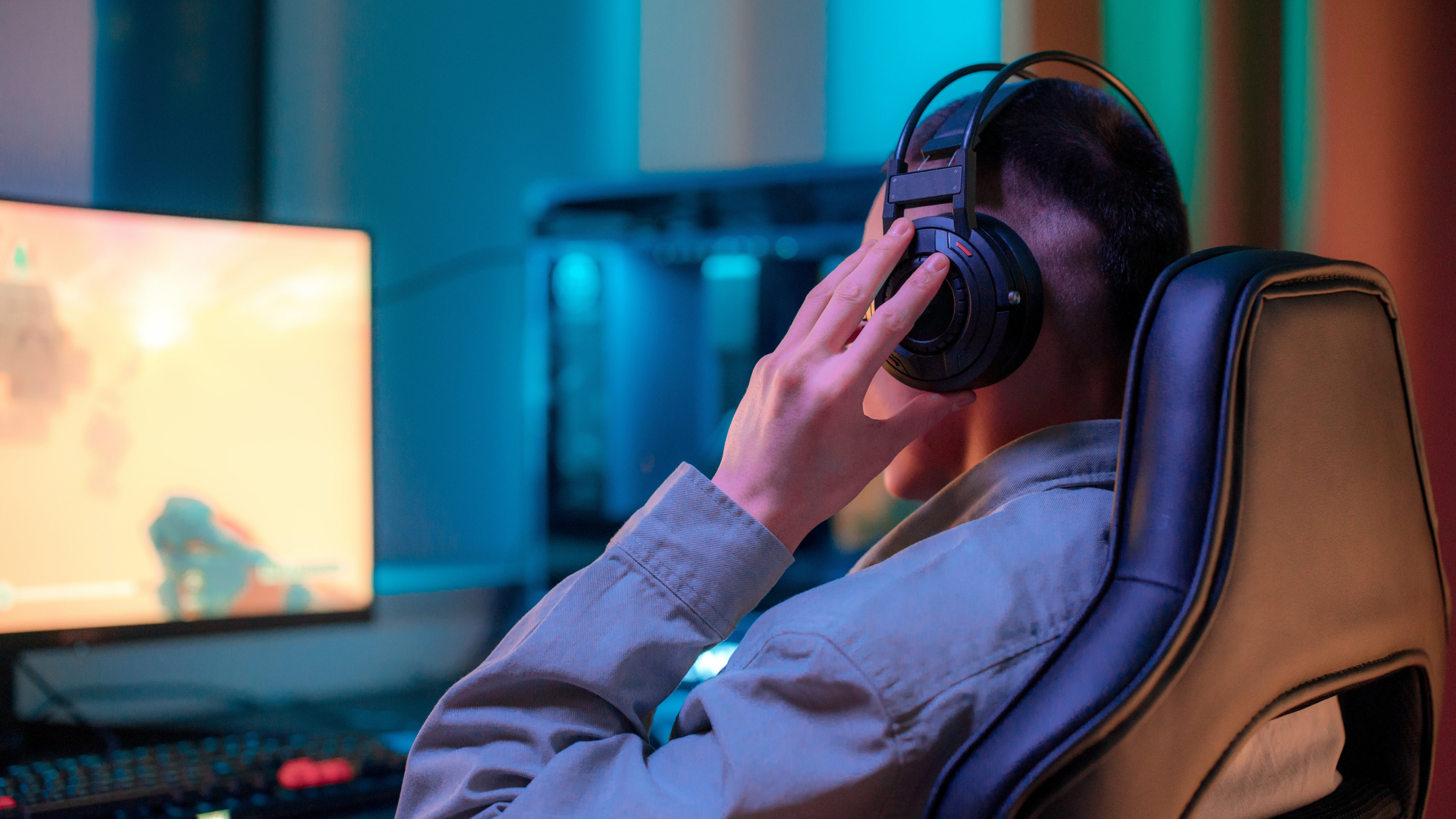 A person wearing a headset playing video games.